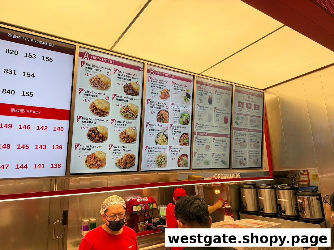 A vibrant digital menu board at Bingz Singapore showcasing a variety of Chinese street food and combo options.
