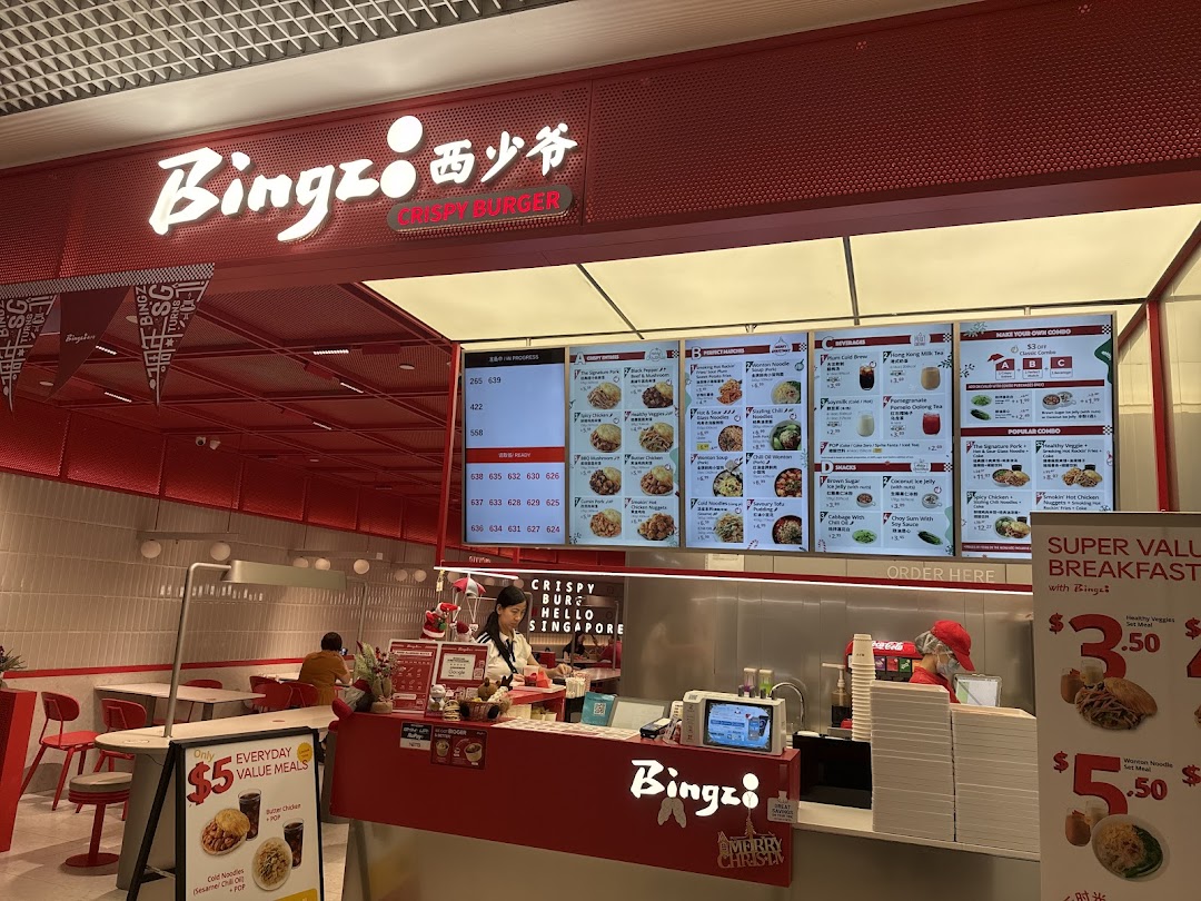Interior view of Bingz Singapore, showing the counter, menu boards, and dining area.