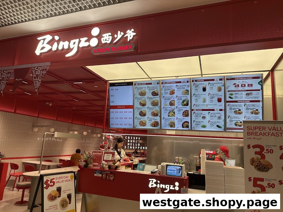 Interior view of Bingz Singapore, showing the counter, menu boards, and dining area.