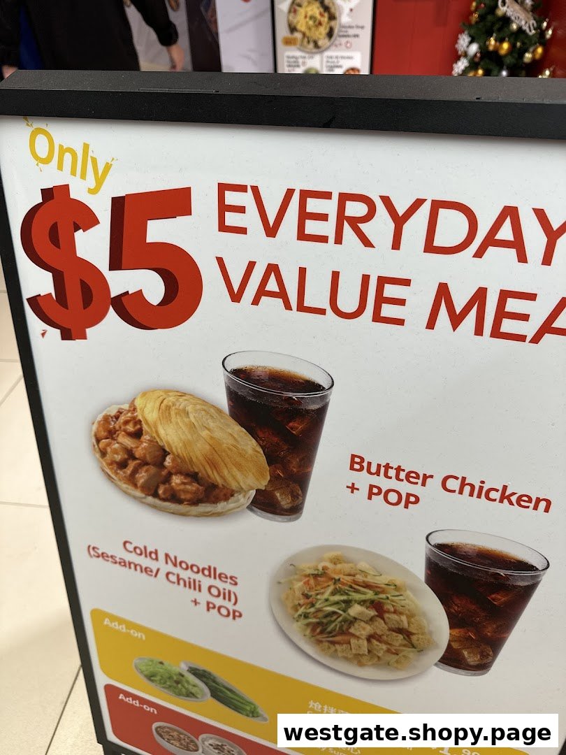 A promotional sign showcasing Bingz's $5 Everyday Value Meals, featuring Butter Chicken and Cold Noodles.