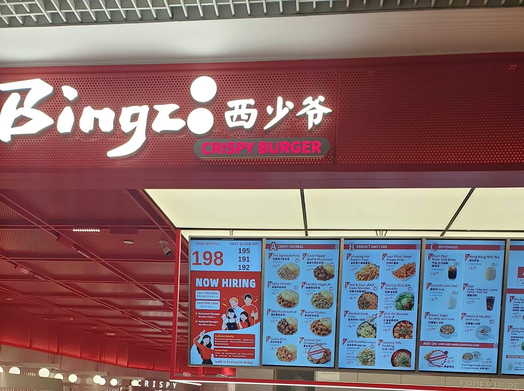 A vibrant display of Bingz Singapore's menu boards featuring crispy entrees, perfect matches, and beverages.
