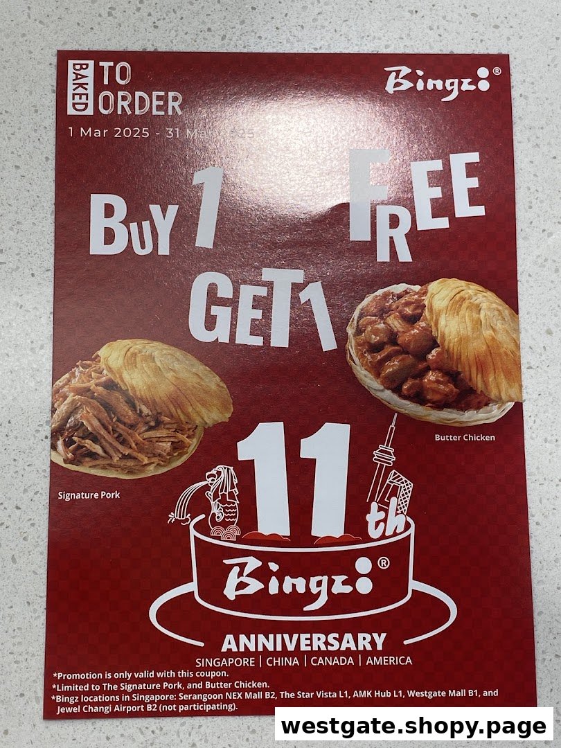 A red promotional flyer for Bingz's 11th anniversary, featuring a Buy 1 Get 1 Free offer on Signature Pork and Butter Chicken.