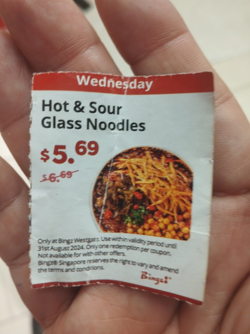 A coupon for Hot & Sour Glass Noodles from Bingz Singapore, showing a special price and offer details.