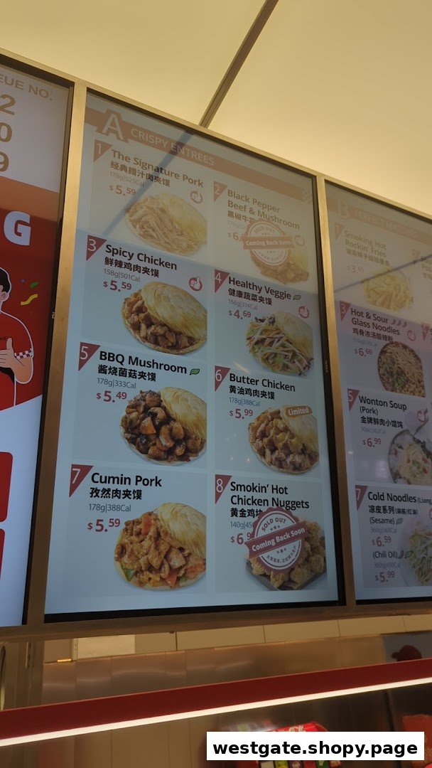 A digital menu board displaying various crispy entrees, noodles, and sides with prices and descriptions.