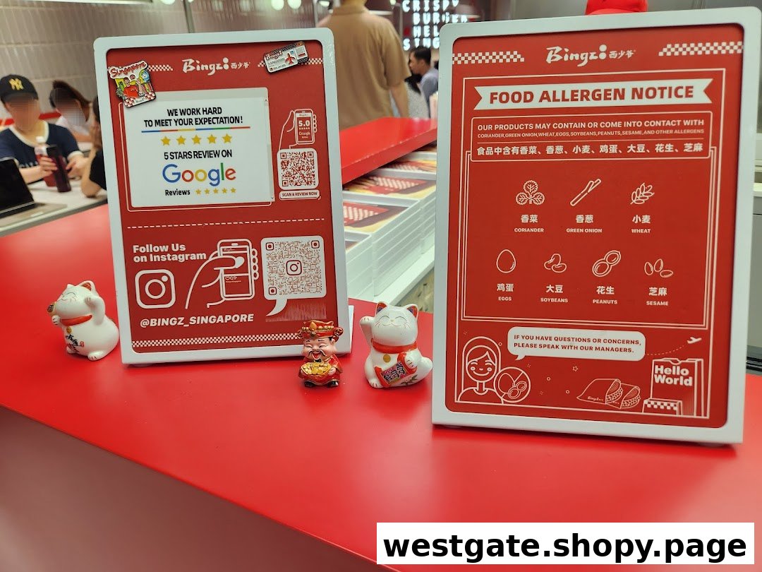 Two red display stands on a counter, one for Google reviews/Instagram, the other for food allergen notice.