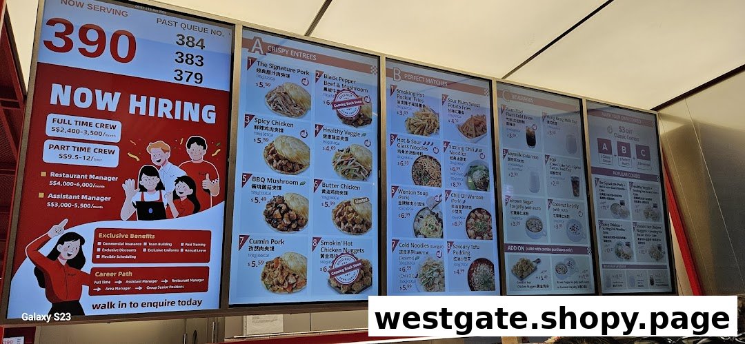 Digital menu boards displaying a variety of Chinese street food, beverages, and hiring information.