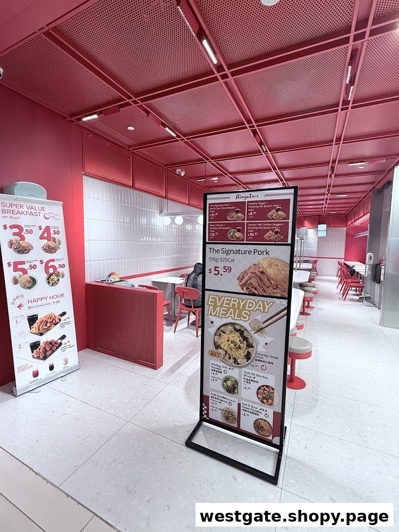 Interior view of Bingz Singapore, featuring vibrant red decor, seating, and prominent menu displays.