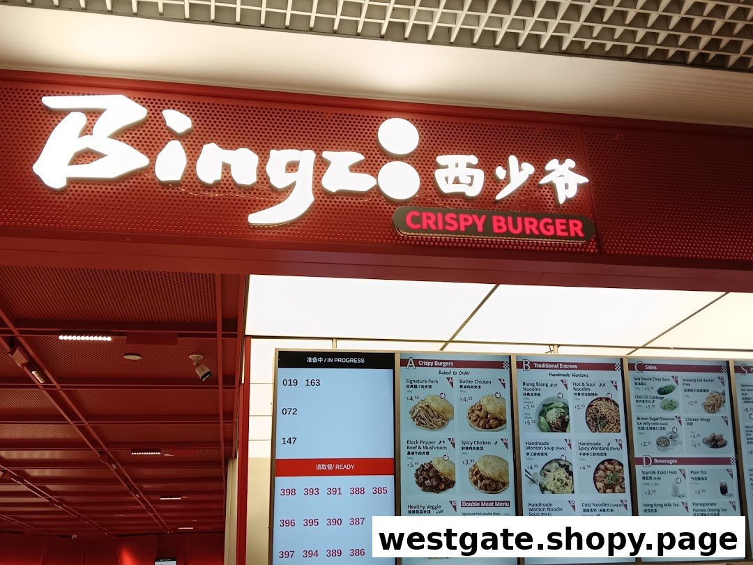 The shop front of Bingz Singapore, featuring its vibrant red signage, menu board, and order display.