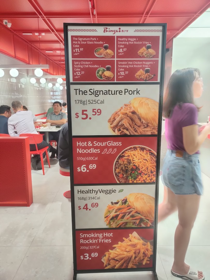 A menu board displaying various Chinese street food items and combos with prices at Bingz Singapore.