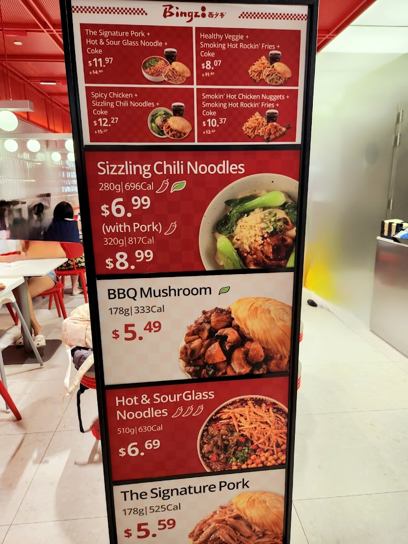 A menu board displaying various food items, combos, and prices at Bingz Singapore.