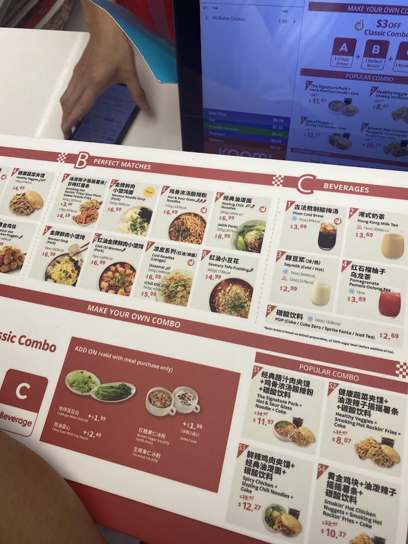 A detailed menu board displaying various Chinese dishes, combos, beverages, and add-ons with prices.