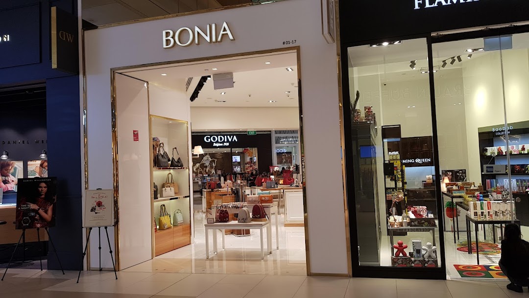 The elegant Bonia shop entrance showcasing a wide array of stylish handbags and accessories within a modern mall setting.