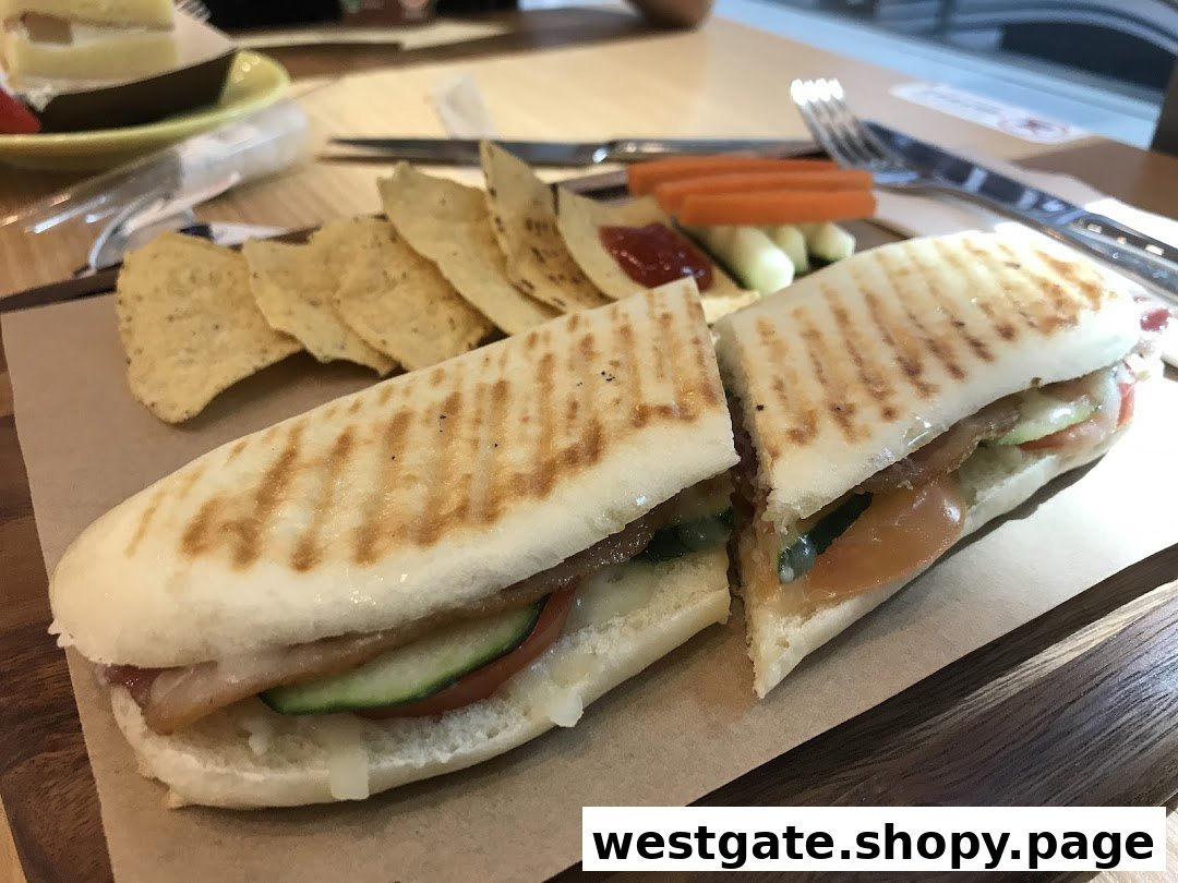 A delicious grilled panini served with tortilla chips and fresh vegetables on a wooden board.