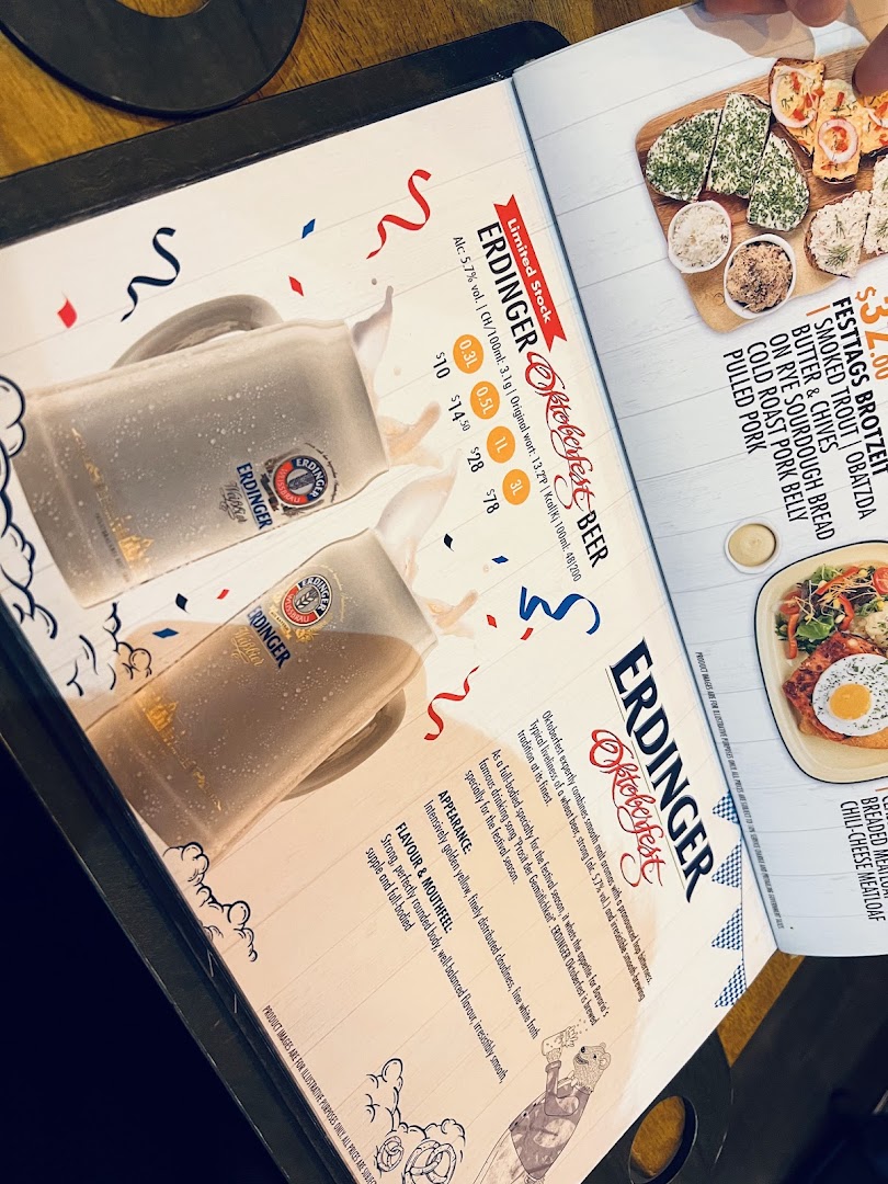 A menu page showcasing Erdinger Oktoberfest beer and a Festtags Brotzeit platter.