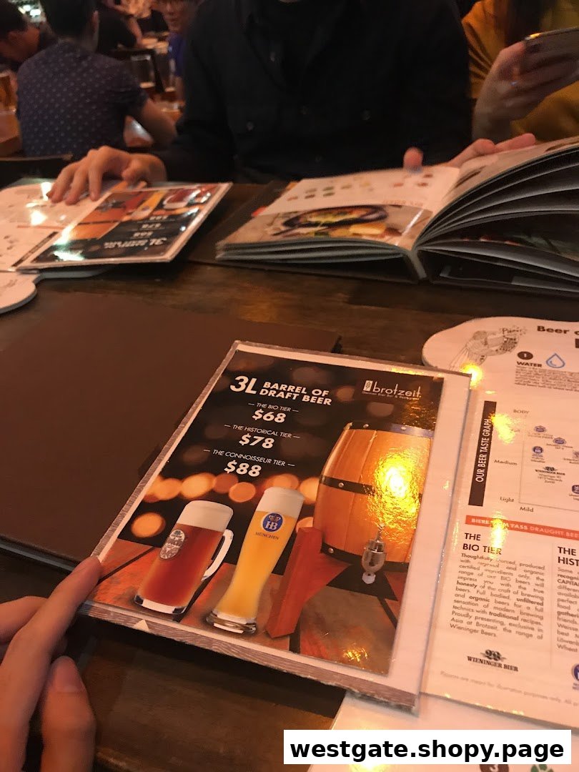 A close-up of a Brotzeit menu displaying a 3L barrel of draft beer promotion.