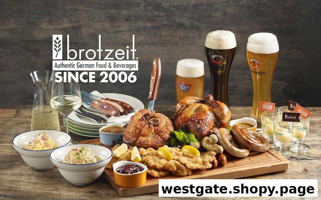 A lavish spread of authentic German dishes, including pork knuckle, schnitzel, sausages, and roasted chicken, with German beers and wine.