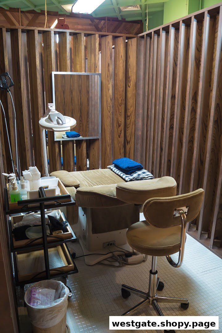 A cozy treatment room at Browhaus, featuring a comfortable bed, adjustable chair, and professional equipment.
