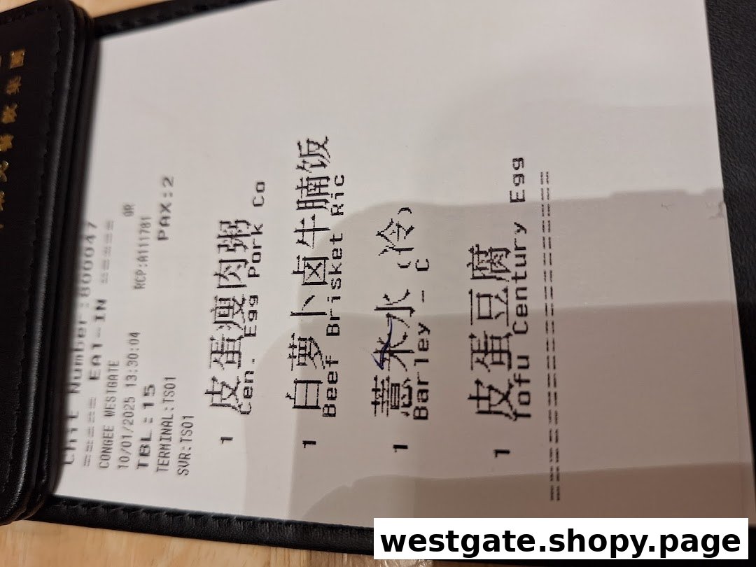 A close-up of a restaurant order slip detailing selected congee, rice, and side dishes.