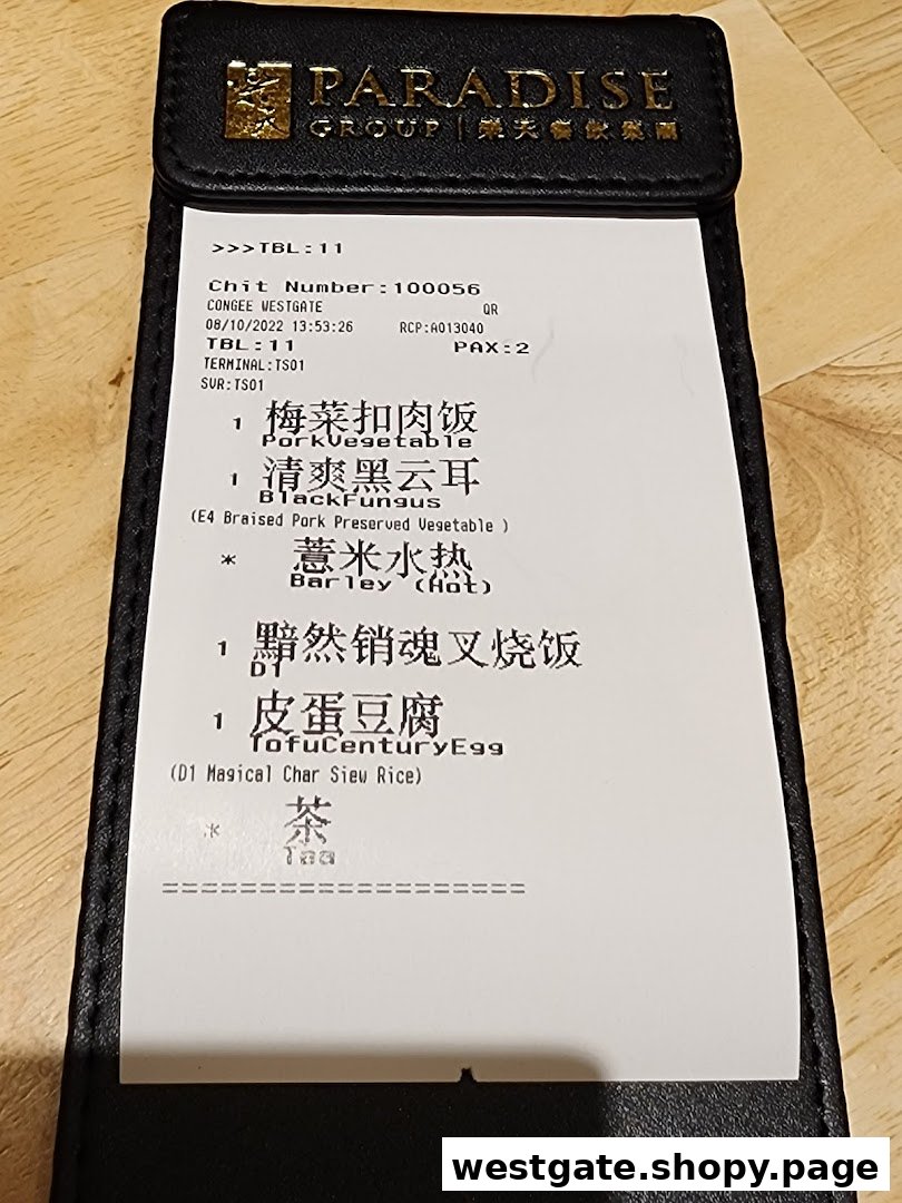An order chit from Canton Paradise Noodle Congee House showing various traditional Chinese dishes.