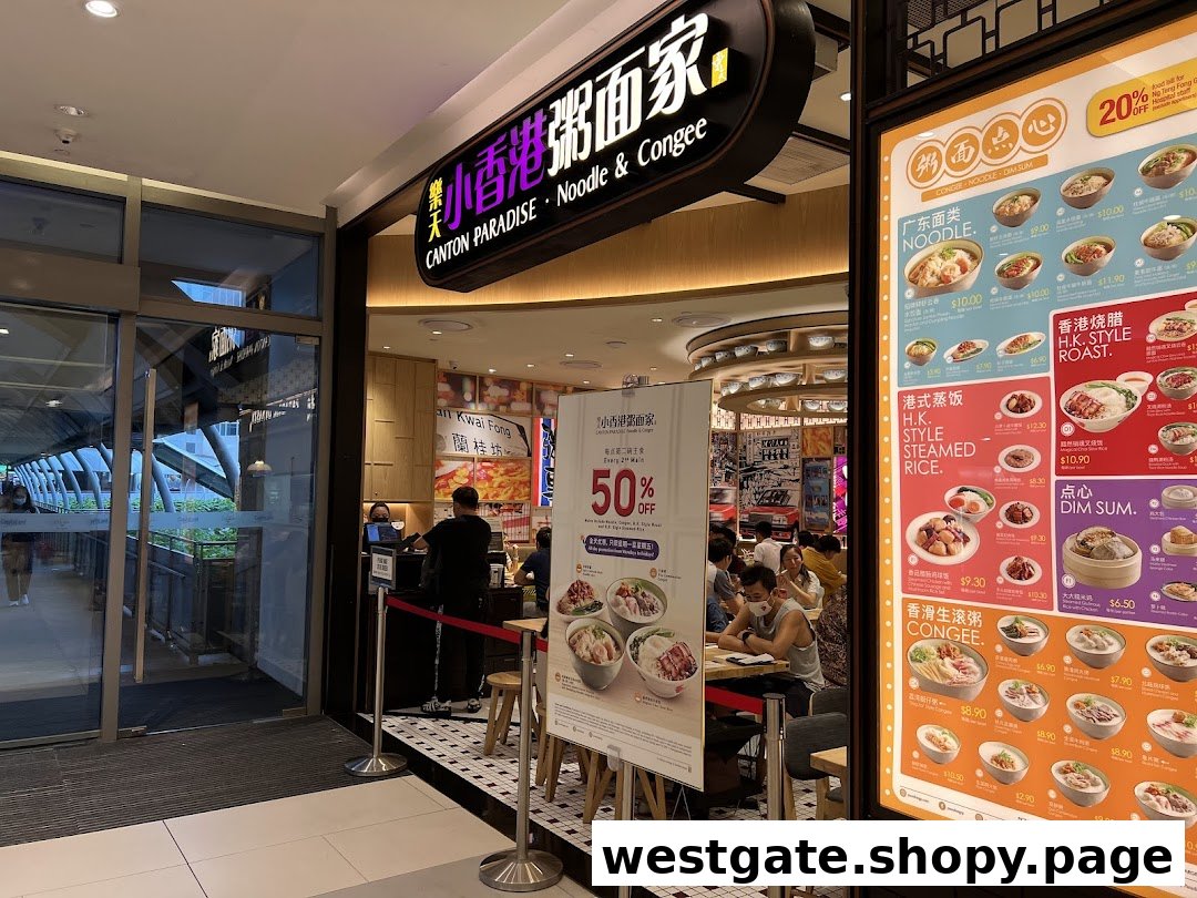 The inviting entrance of Canton Paradise Noodle & Congee House, showcasing its menu and interior dining area.