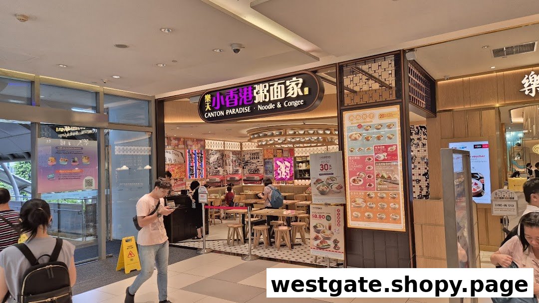 The shop front of Canton Paradise Noodle & Congee House, featuring its entrance, signage, and customers.