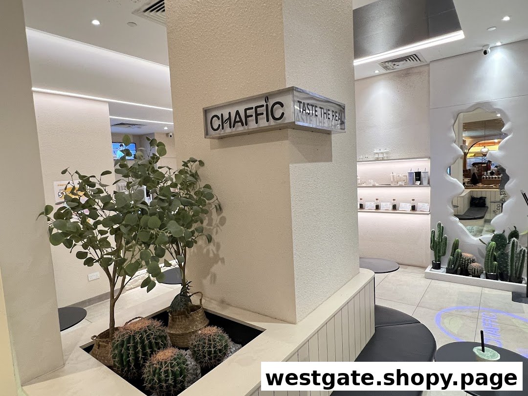An interior view of Chaffic Westgate, featuring modern decor, plants, and seating areas.