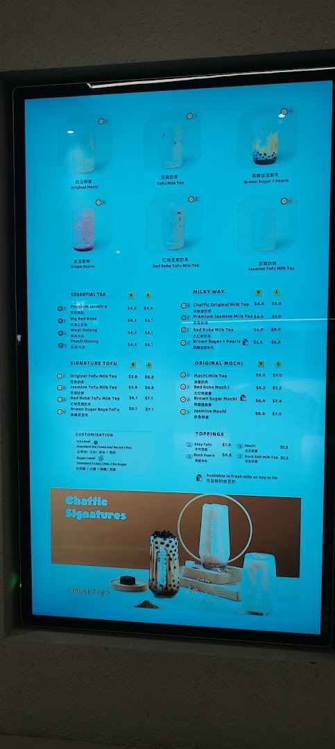 A digital menu board displaying various bubble tea and tofu milk tea options at Chaffic Westgate.