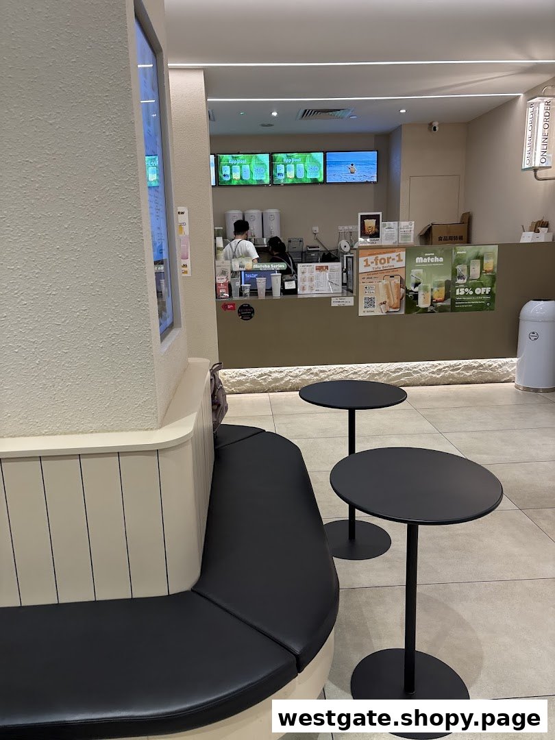 Interior view of Chaffic Westgate, showing the service counter, staff, and a cozy seating area.
