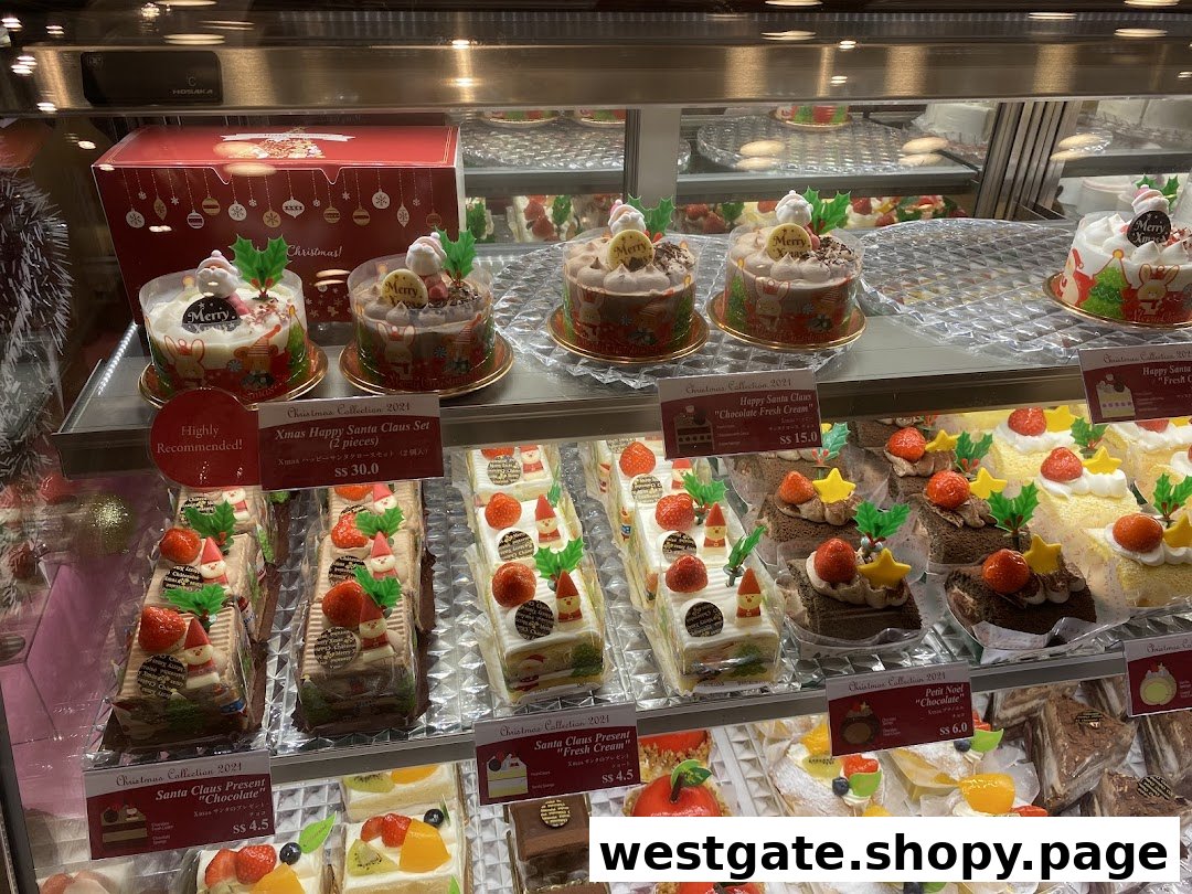 A vibrant display case showcasing Châteraisé's festive Christmas cakes and pastries.