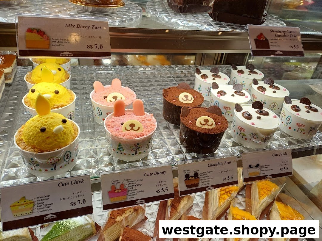 A vibrant display of Châteraisé's adorable animal-themed cakes and delicious tarts.
