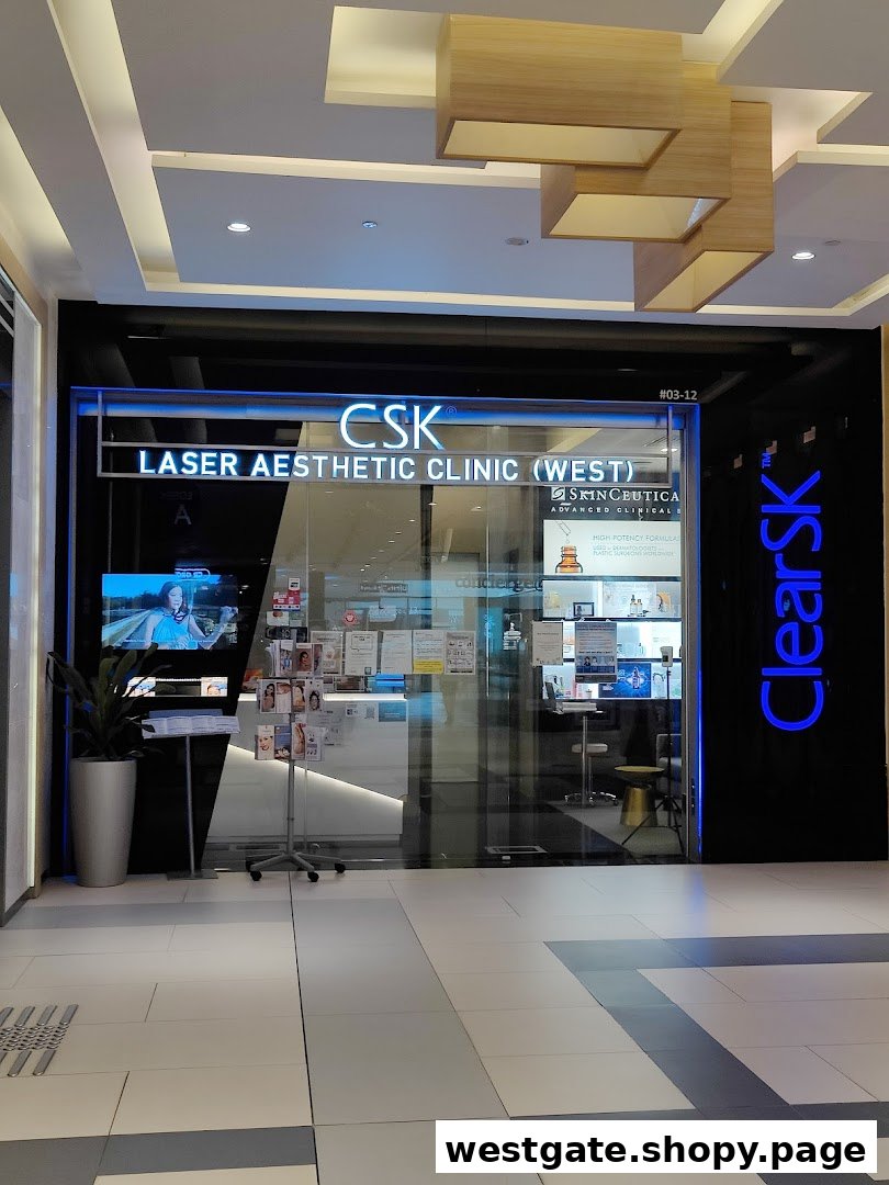 The illuminated entrance of ClearSK Aesthetic Clinic Westgate, featuring its name and services.