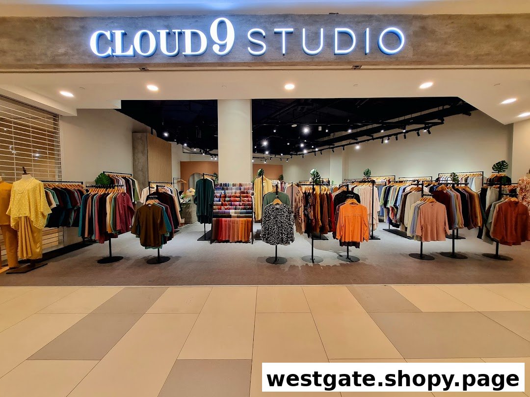 The storefront of Cloud 9 Studio, showcasing a wide array of stylish clothing on display.