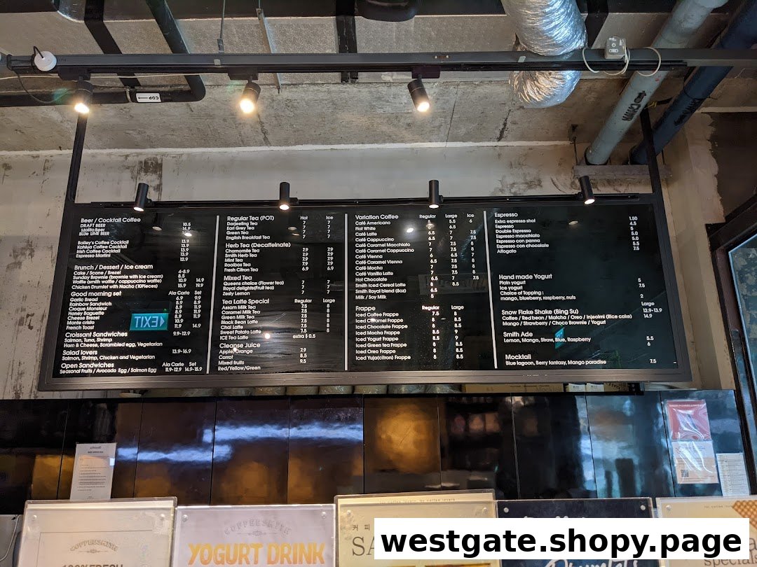 A comprehensive menu board displaying a wide range of coffee, tea, brunch, and dessert options at Coffeesmith.