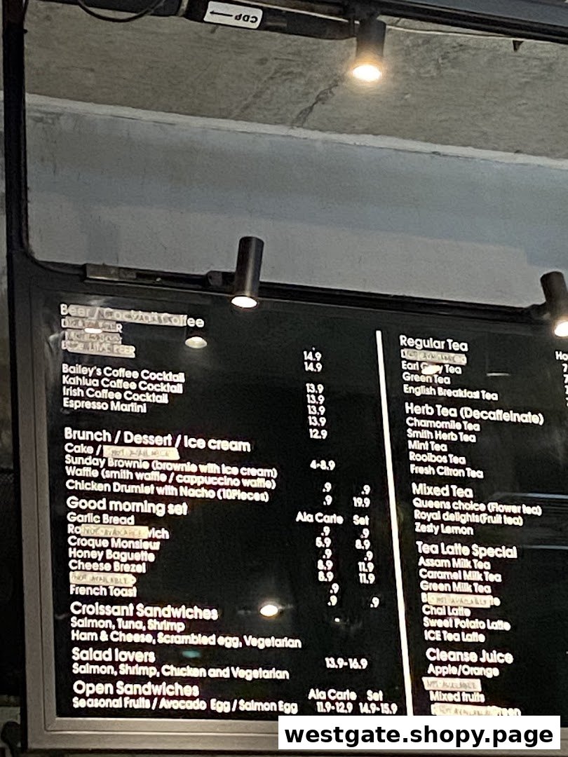 A digital menu board displaying a variety of coffee, tea, brunch, and sandwich options with prices.