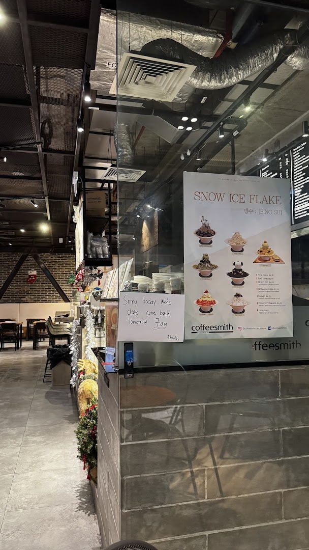 A detailed menu board for Snow Ice Flake (Bing Su) desserts at Coffeesmith, with a closure notice.