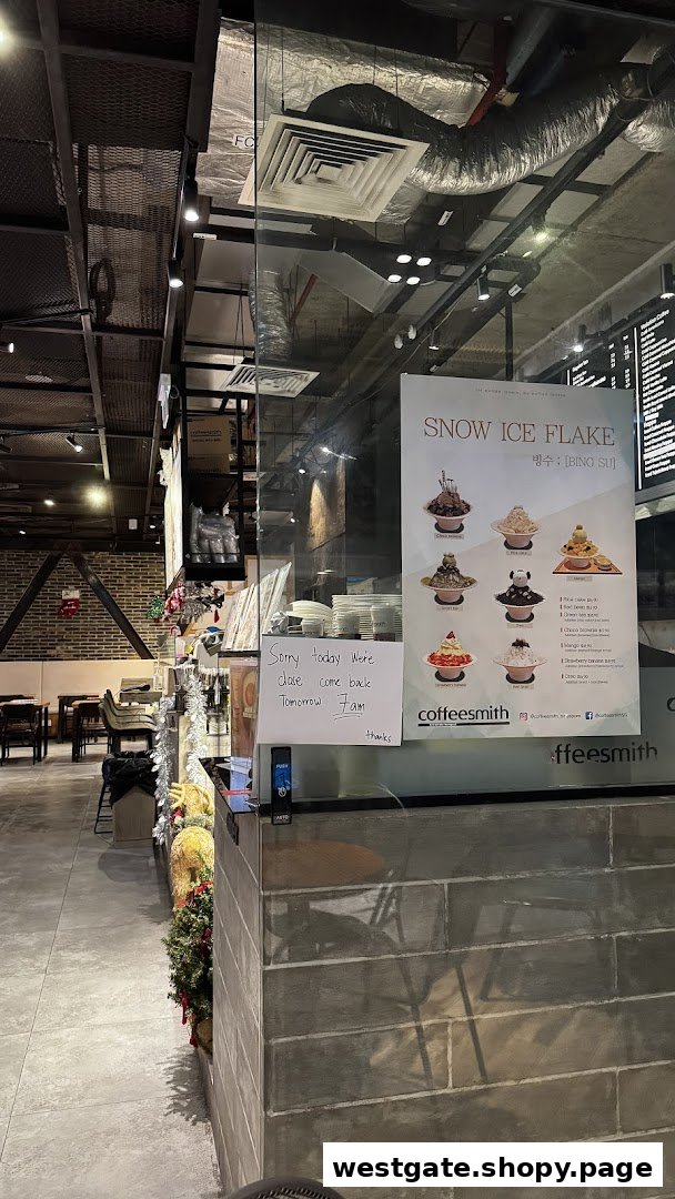 A detailed menu board for Snow Ice Flake (Bing Su) desserts at Coffeesmith, with a closure notice.