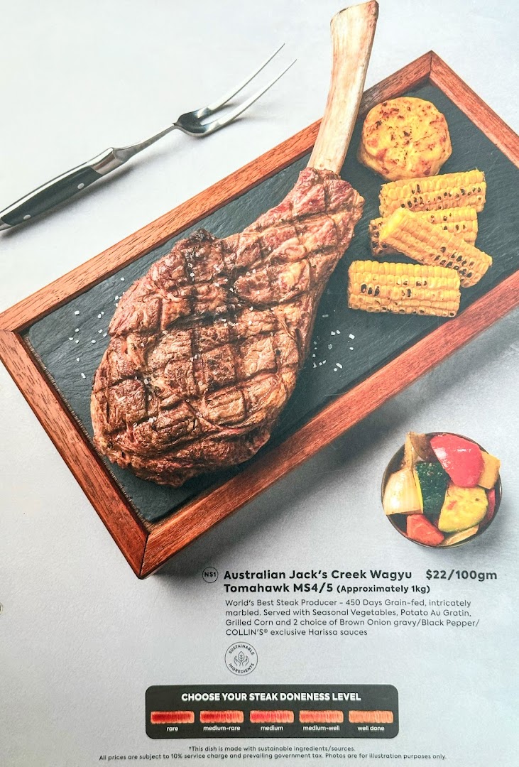A large grilled Tomahawk steak with sides and menu details from COLLINS.