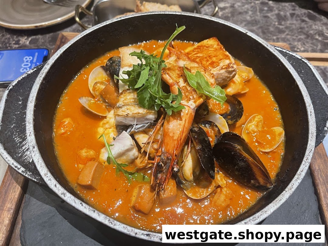 A vibrant seafood stew with prawns, mussels, clams, and fish in a rich tomato-based sauce.