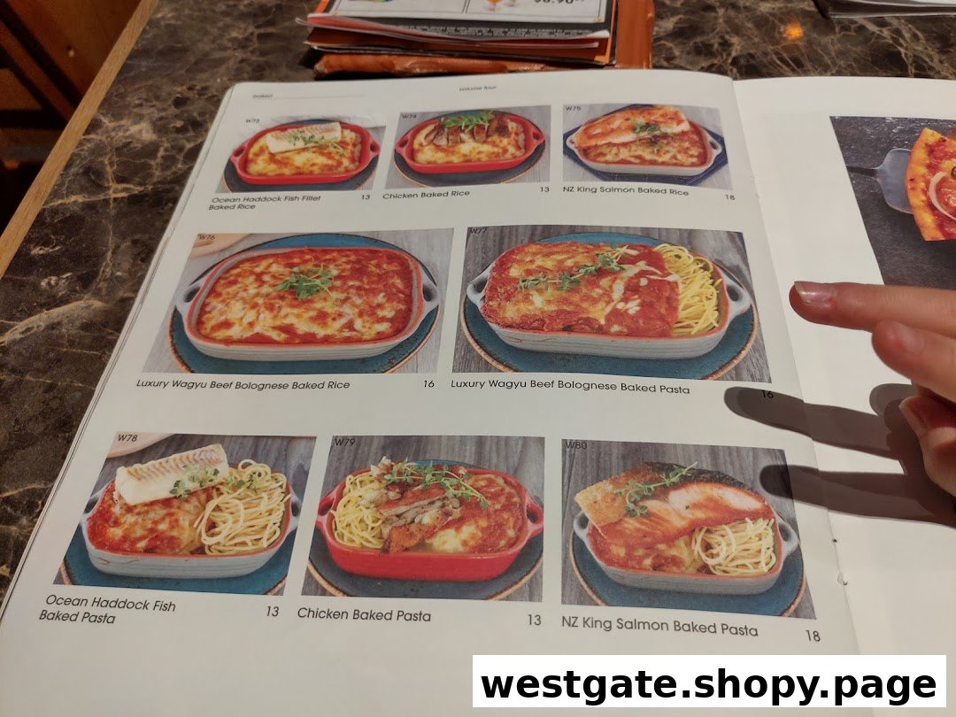 A menu page from COLLINS Westgate showcasing various baked rice and pasta dishes with prices.