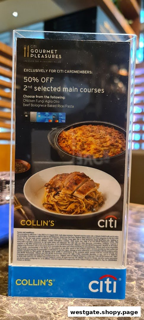 A promotional stand at COLLIN'S restaurant featuring a Citi cardmember dining offer.