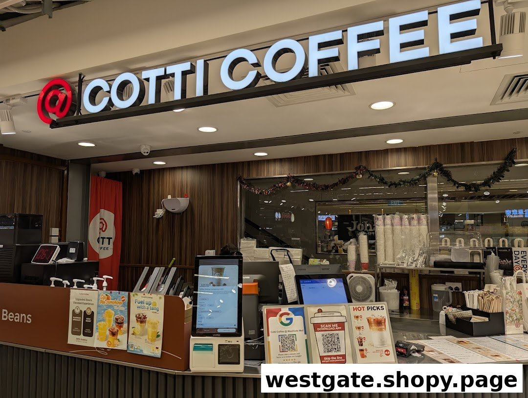 The vibrant counter and service area of Cotti Coffee, showcasing branding and promotional displays.