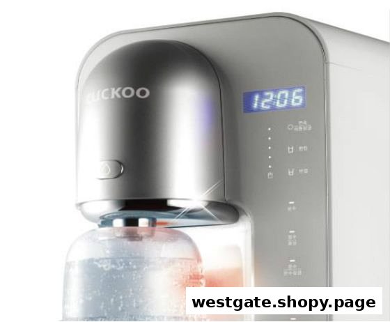 Close-up of a modern CUCKOO water dispenser with digital display and control panel.