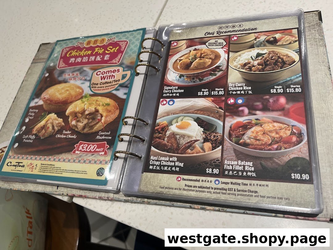 A detailed menu from Curry Times, showcasing chicken pies, curry dishes, and Nasi Lemak.