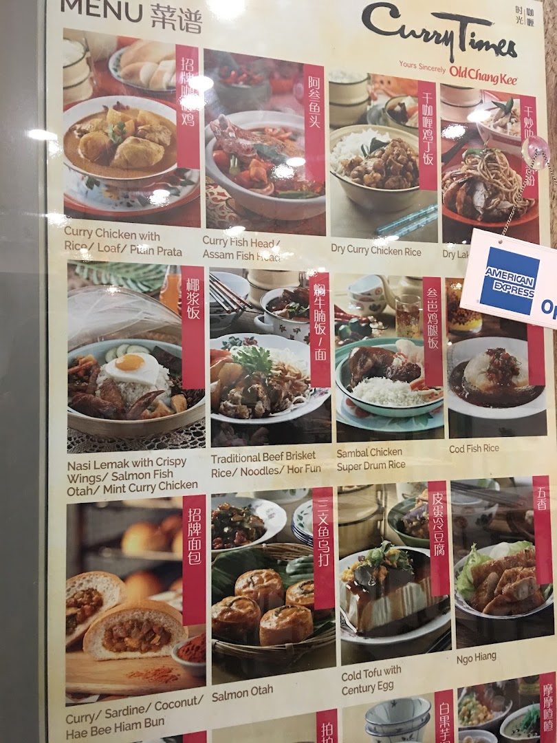 A vibrant menu board from Curry Times, showcasing various curry dishes, rice meals, buns, and traditional sides.