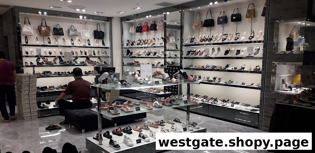 Interior view of a DC - Design Comfort shoe and handbag store, showcasing various footwear and accessories.