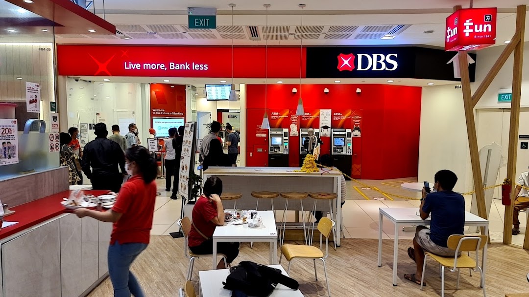 The entrance of DBS Bank at Westgate, featuring ATMs and a customer service area.