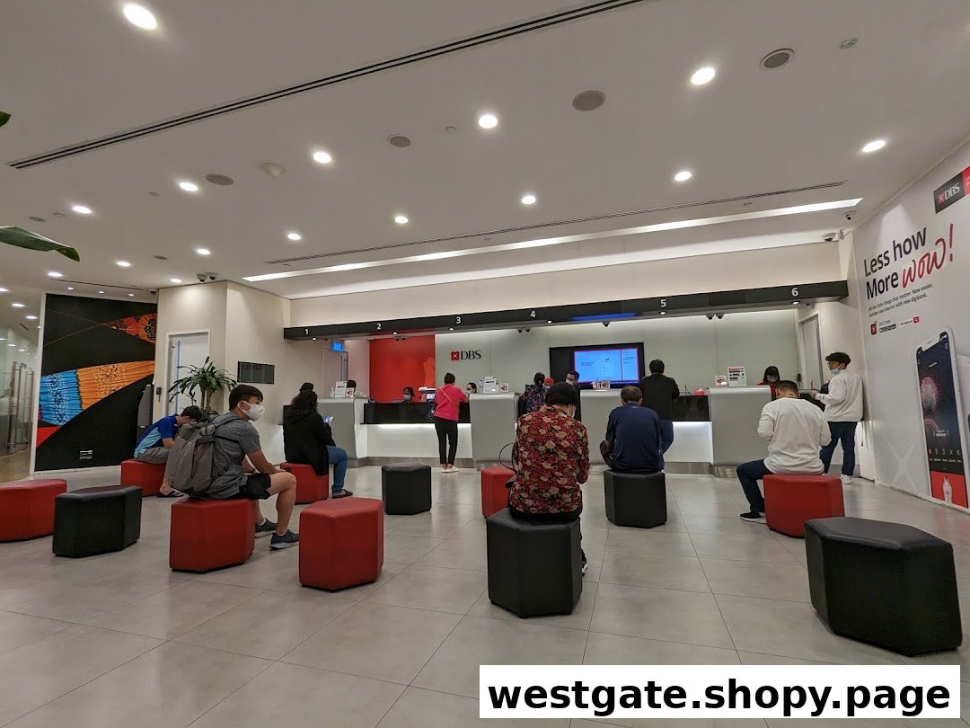 Customers waiting and being served at the counters inside a DBS bank branch.
