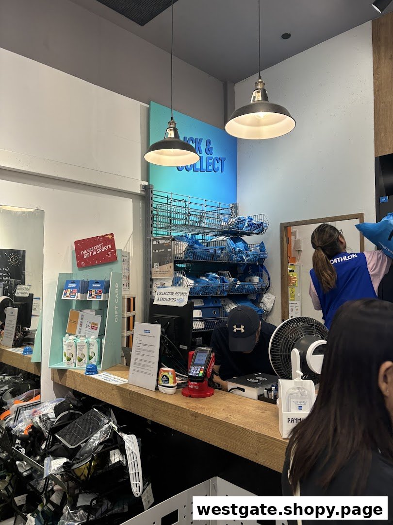 Decathlon's Click & Collect counter with staff assisting customers and sports equipment visible.