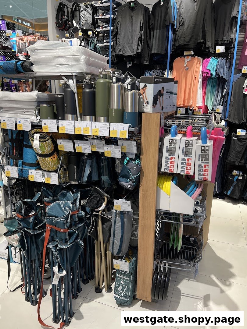 An interior view of Decathlon showcasing a wide range of sports and outdoor equipment, including bottles, chairs, and apparel.