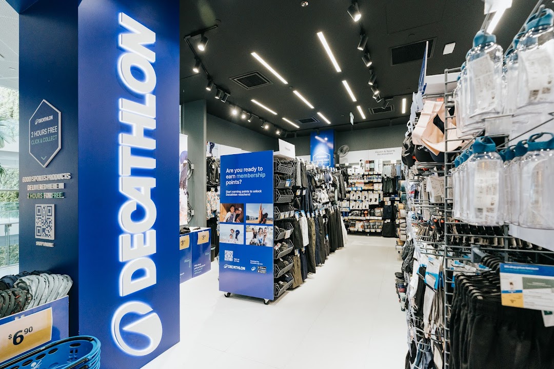 Interior view of Decathlon, showcasing a wide range of sports products and the brand's blue signage.